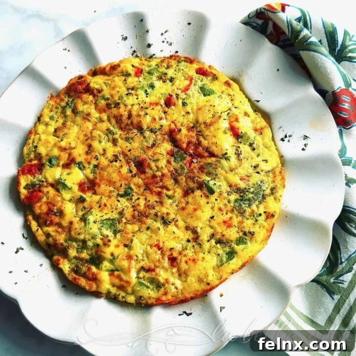Cheesy Italian Frittata with Peppers and Tomatoes