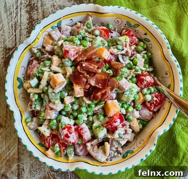 Creamy Lemon Parmesan Pea Salad in a bowl