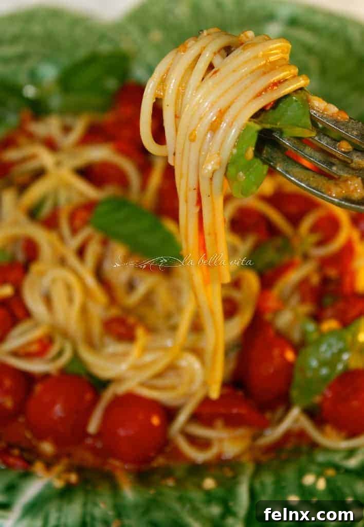 Spaghetti tossed with roasted tomatoes and fresh basil
